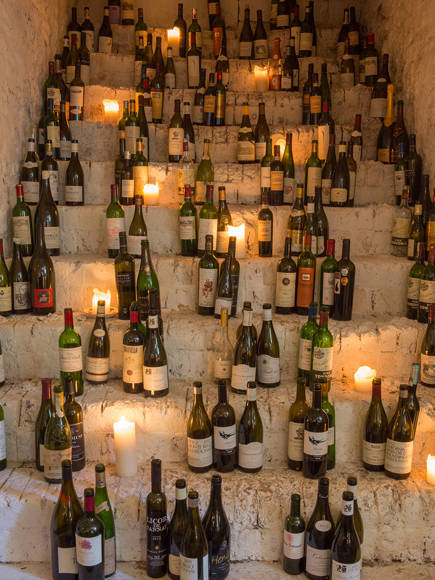 Wine bottles on cellar stairs.jpg